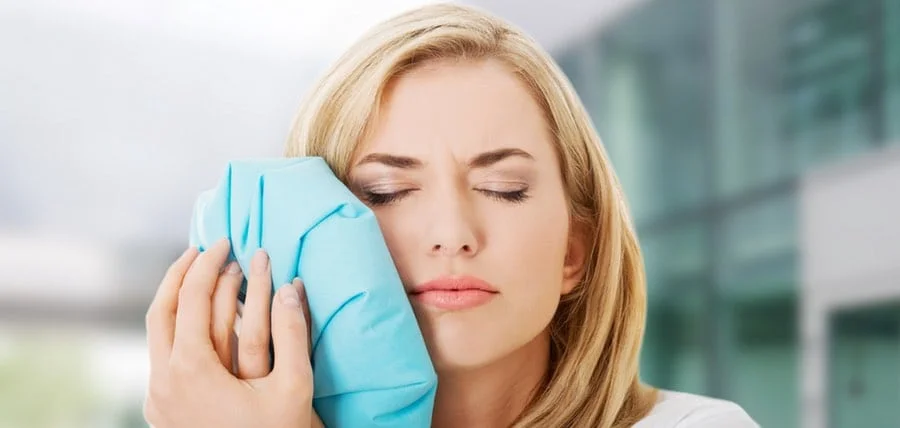 отек после удаления зуба фото